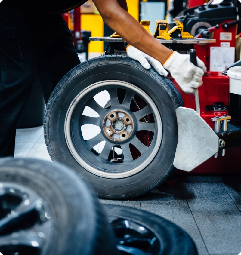 Mechanic removing tire